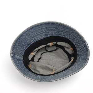 Distressed blue denim bucket hat with internal adjustable drawstring and sun protection