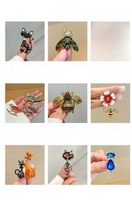Detailed grid of nine cute enamel cat brooches with colorful rhinestones and motifs