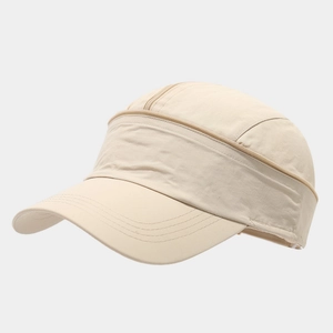 Detailed shot of the zipper top design on the beige quick-dry outdoor sports hat