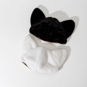 Black and white plush cat ear beanies in premium faux mink fur for autumn and winter