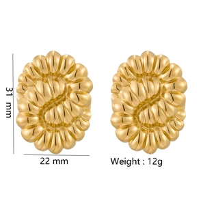 Detailed view of gold oval stud earrings with shell texture and size dimensions 31mm by 22mm
