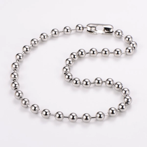 Macro shot of silver 10mm ball chain necklace in stainless steel with clasp detail