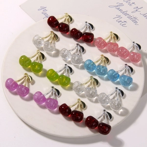 Colorful resin cherry pendants in red, pink, and blue with gold and silver stems