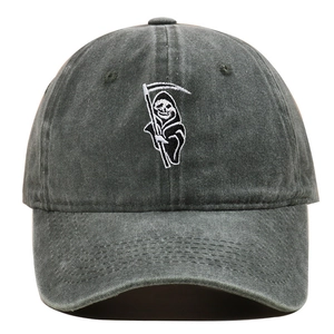 Close-up of Grim Reaper embroidery on washed dark grey cotton baseball cap