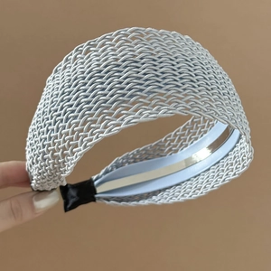 Elastic braided wide headband in light blue silk texture for elegant hair styling