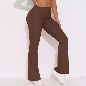 Detail view of high waist brown yoga leggings with wide tummy control and flared leg hem