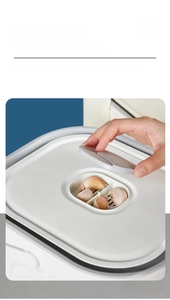 Detail view of moisture-proof rice container lid with integrated pest control herb box
