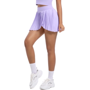 High-waisted lavender pleated tennis skirt with quick-dry fabric and built-in shorts