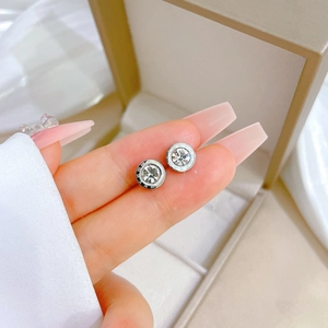 Titanium steel stud earrings with Roman numerals and central round zircon crystal