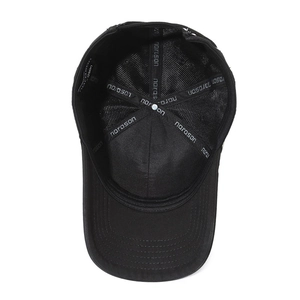 Internal view of black cotton baseball cap showing reinforced seams and six-panel structure