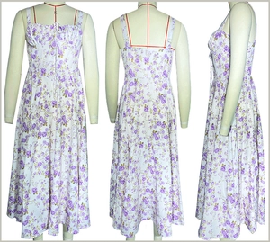 Front, side and back views of a floral sleeveless sundress with a high side slit