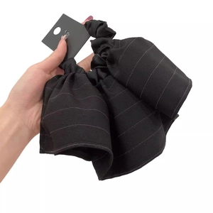 Elegant black striped pleated scrunchie hair accessory with vintage organza style texture