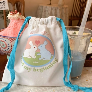 Cute bunny design canvas drawstring storage bag for travel and cosmetics with blue ropes