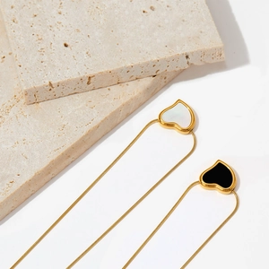 Elegant gold-plated stainless steel necklaces with black and white heart pendants