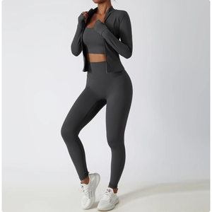 Three-piece dark gray yoga set including zip jacket, sports tank top, and high-waist leggings