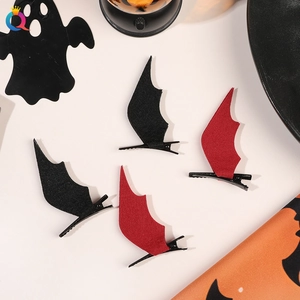Set of four red and black bat wing hair clips for Halloween costume accessories