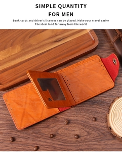 Retro brown leather men's wallet with multi-card slots and clear ID window on wood