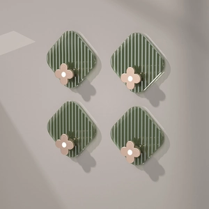 Set of 4 luxury dark green wall hooks with golden flower accent for towels and clothes