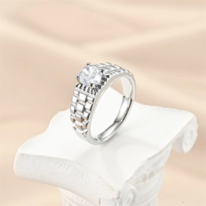 Detailed macro view of silver titanium steel ring with micro-paved round zircon on Roman pedestal
