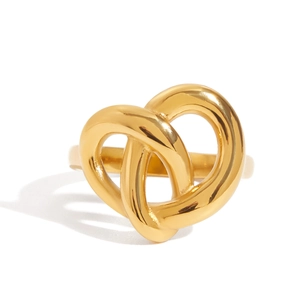 Polished gold titanium steel knot ring for women with minimalist aesthetic design