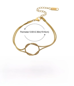 Detail of gold stainless steel knot bracelet showing size 15+6cm and 3.9g weight specs