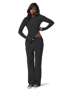 Detailed view of black striped two-piece set featuring a slim top and wide-leg trousers