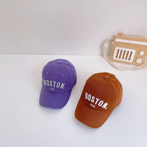 Close-up of purple and brown cotton kids baseball caps featuring Boston 1630 embroidery
