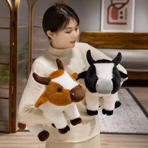 Plush cow stuffed animal in brown and black patterns, cozy soft toy for kids and decor