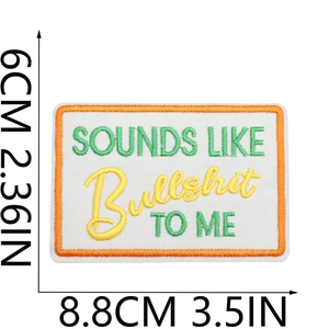 Detail showing 8.8x6cm embroidered patch with 'Sounds Like Bullshit To Me' quote