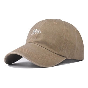 Khaki washed cotton baseball cap with vintage poker ace embroidery and structured texture