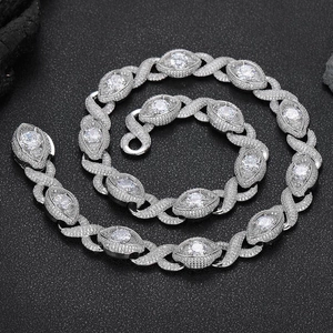 Silver-toned iced out Cuban chain necklace with oval zircon stones and pavé link details