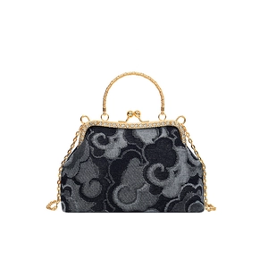 Vintage denim cloud pattern handbag with rhinestone clasp and gold chain strap