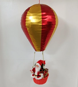 Detail of Santa Claus hot air balloon hanging ornament with red and gold stripes