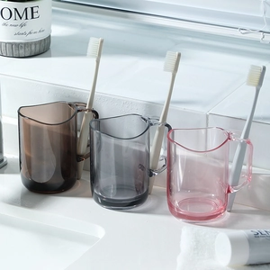Three-piece set of translucent plastic mouthwash cups with multifunctional handles for toothbrushes