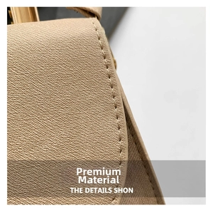 Close-up of beige Saffiano leather texture and premium stitching on this crossbody bag
