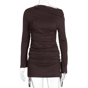 Close-up of ruched side drawstring and ribbed fabric texture on chocolate brown mini dress