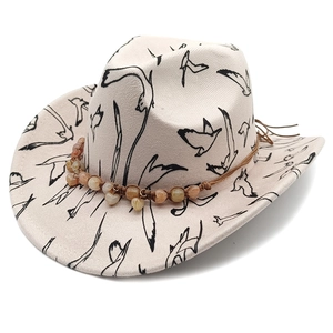 Wide-brimmed felt fedora with black flying bird prints and beaded heart decorative band
