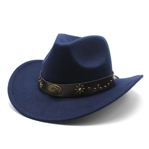 Detail of blue felt cowboy hat featuring brown leather band with vintage copper flower studs