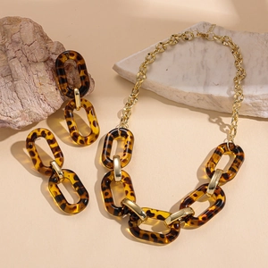 Retro leopard print acrylic necklace and earring set with chunky gold-tone links