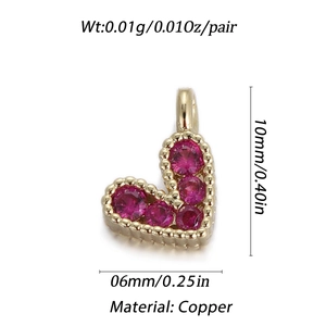 Detailed specs for 14k gold-plated copper heart charm with pink gem and dimensions