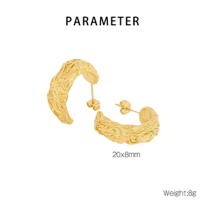 Detail view of vintage golden C-shape earrings with irregular pleated texture 20x8mm