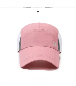 Close-up of pink quick-dry baseball cap with white breathable mesh and gray logo