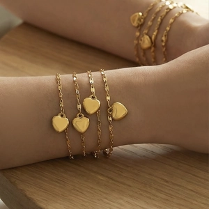 Elegant minimalist 18k gold plated stainless steel bracelet with heart charms for women