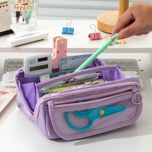 Detail of purple large capacity pencil case with transparent window and stationery organizers