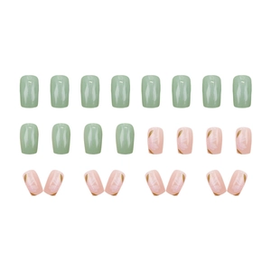 Green and pink floral press-on nail set with gold accents in minimalist Chinese style