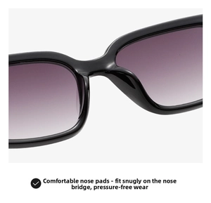 Detail of integrated nose pads on black square sunglasses with purple gradient lenses