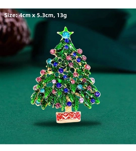 Detail of Christmas tree brooch with green enamel and multi-color rhinestones, 4cm x 5.3cm