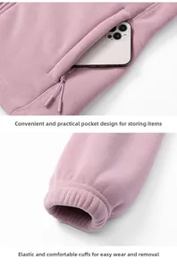 Detail of purple fleece jacket featuring zip security pocket and elastic cuffs