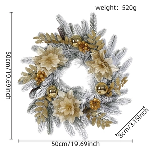 Detail view of 50cm snowy Christmas wreath with golden flowers, berries, and pine cones