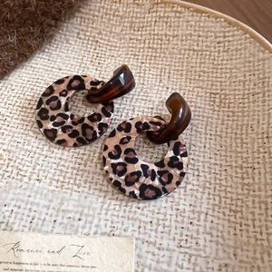 Retro acrylic leopard print round hoop earrings with elegant brown hooks for women